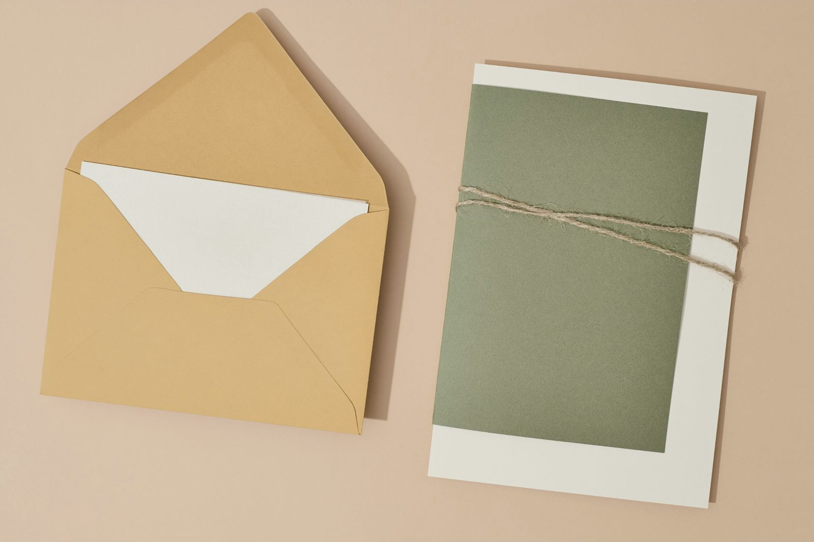 Paper envelopes and a card tied with string